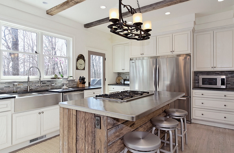 Stainless steel surfaces in a rustic style kitchen