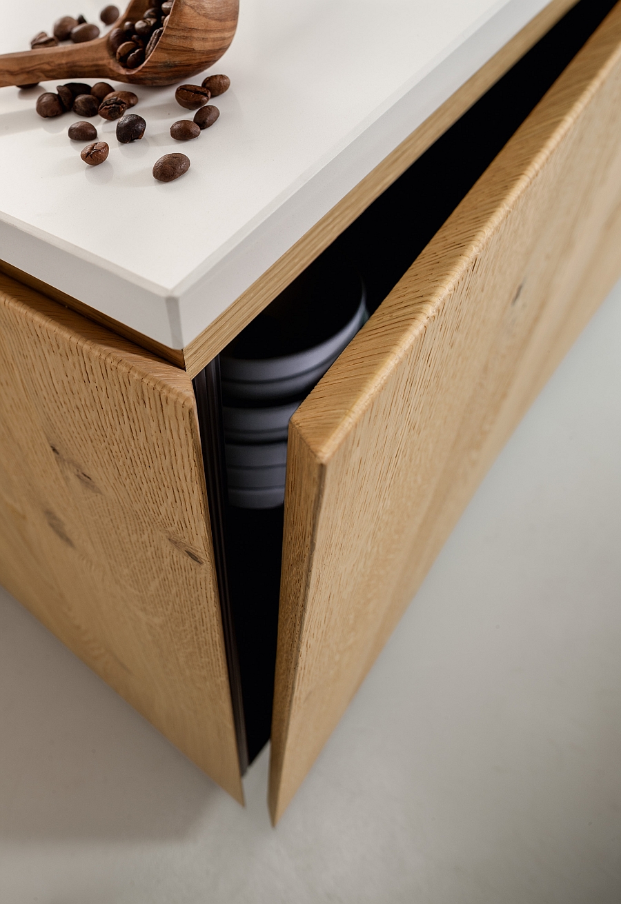 Thick kitchen island doors in natural oak with handle-less design