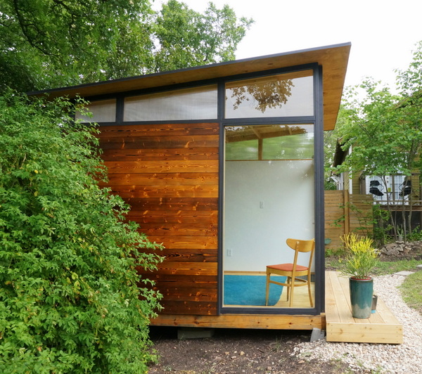 Tiny house with floor-to-ceiling windows