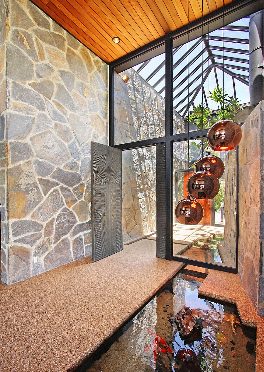 Tom Dixon Copper Pendat Lights above the Koi Pond