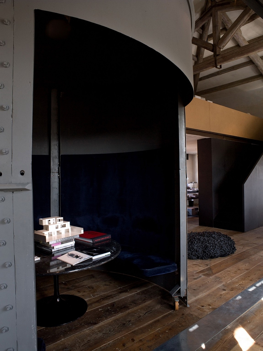 Unique interior of the windmills house with the Tulip table