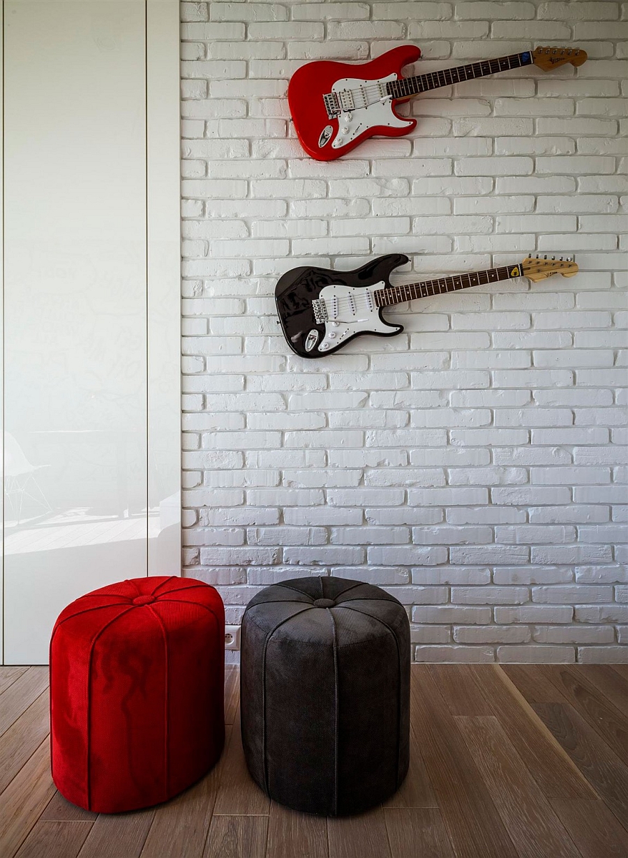 Wall-mounted guitars in the kids' bedroom