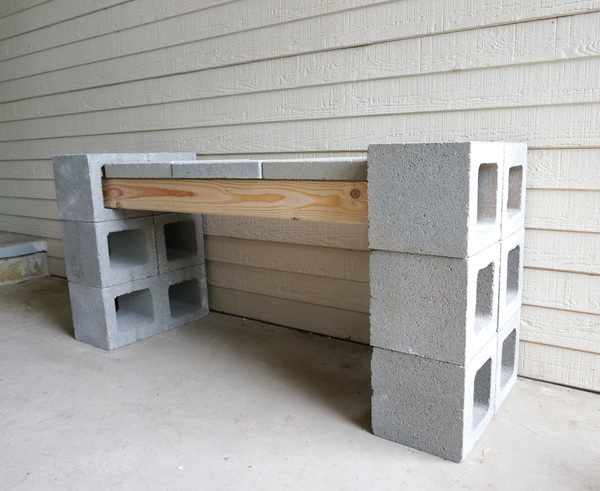 Wood, cinder blocks and pavers form a sturdy bench