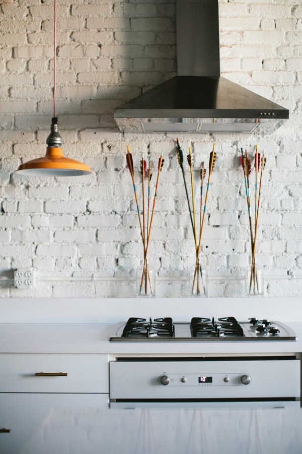 white-washed brick backsplash