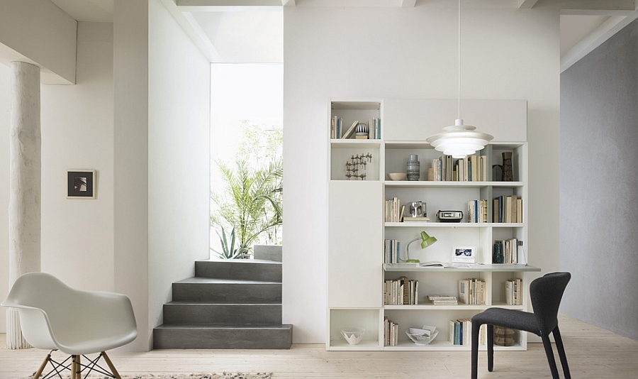 A built-in workstation and reading space in the living room wall unit