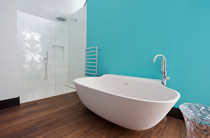 A refreshing touch of aqua turns the white standalone tub into a focal point!