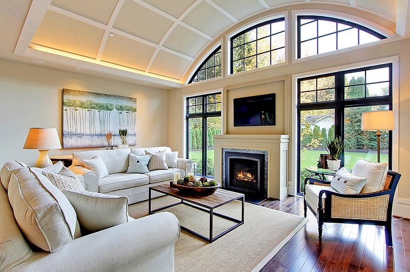 Ambient lighting plays a major role in the living room with TV above fireplace