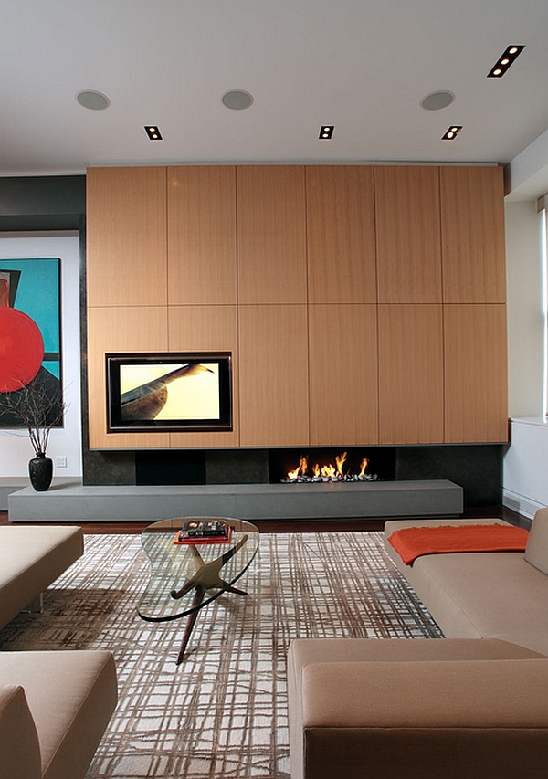 An artistic touch to the fireplace and TV combo!