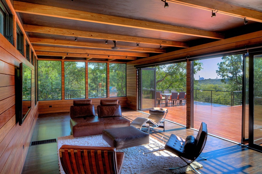 An interior that is seamlessly connected with the expansive wooden deck outside