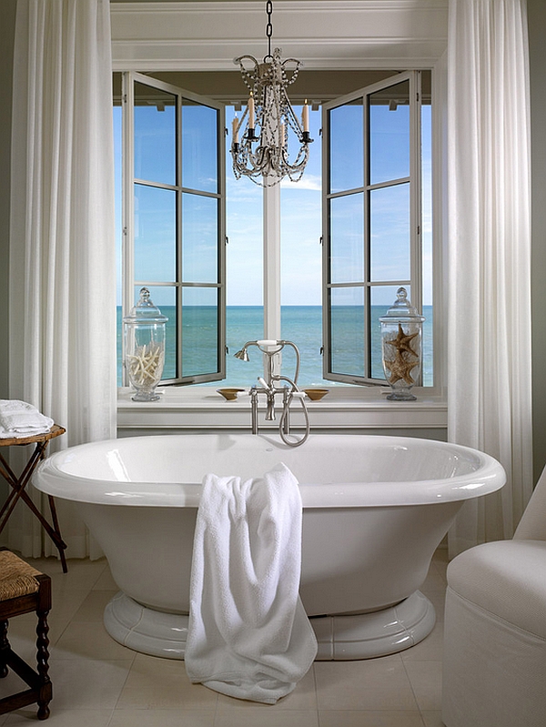 Apothecary jars with starfish add to the beach style of the bathroom