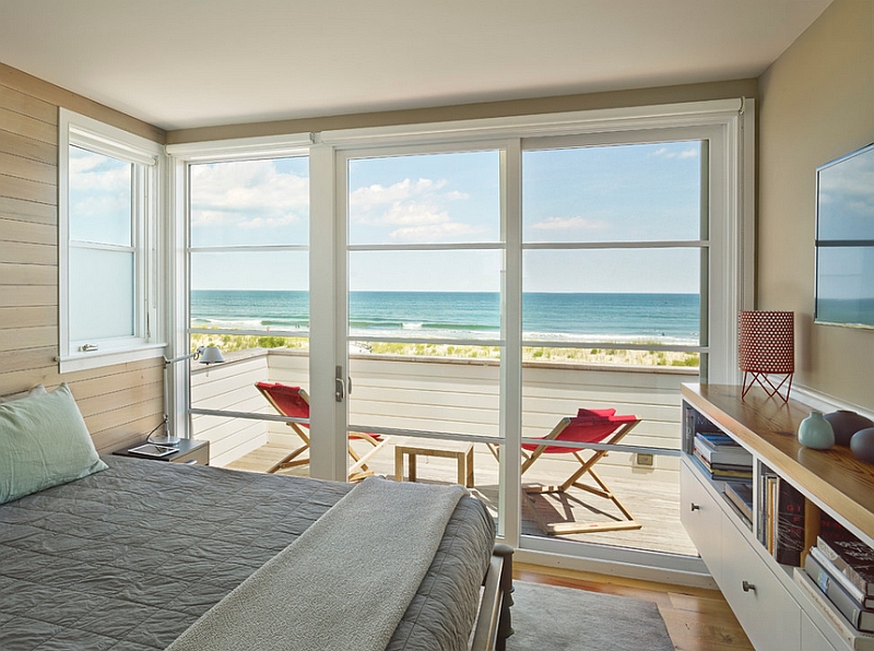 Beach style bedroom with cool sliding doors