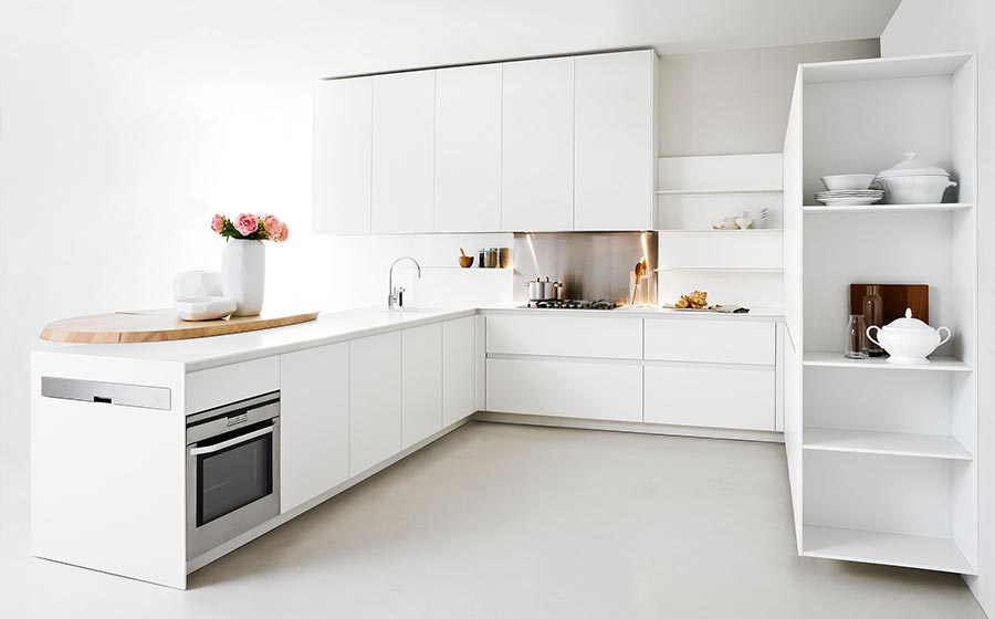 Beautiful all-white, minimalist kitchen for the small urban apartment