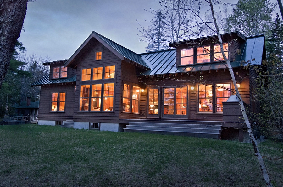 Beautiful, warm lighting adds to the cozy rustic appeal of the cabin retreat
