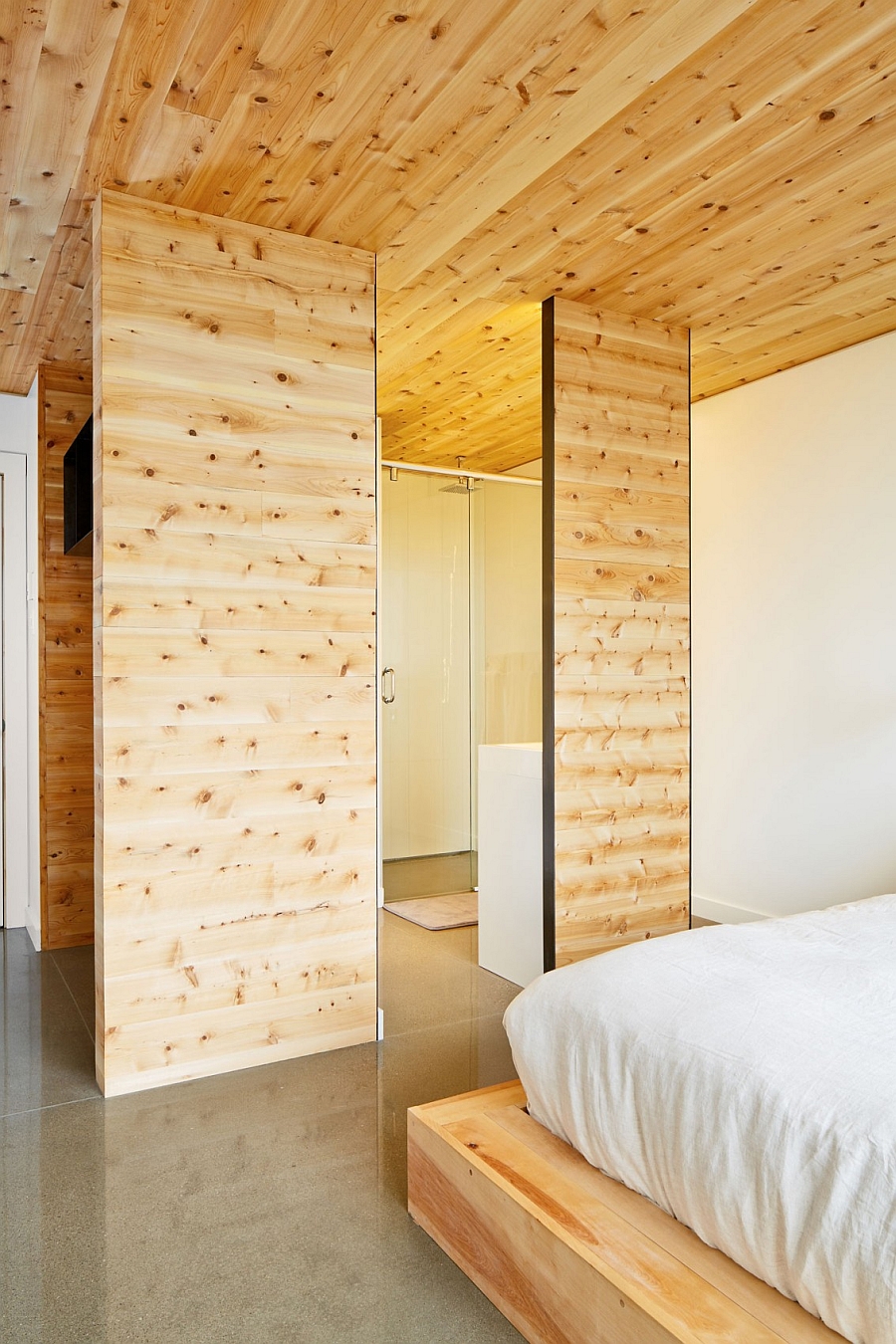 Bedroom walls clad in wood