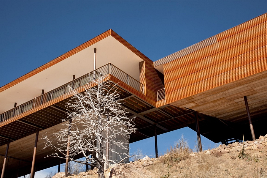 Cantilevered Mountain home with a wooden exterior