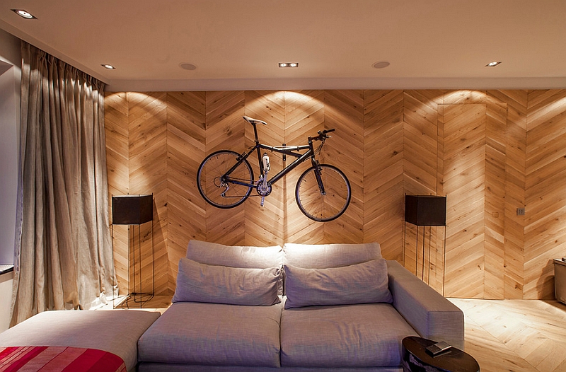 Chevron wall offers the perfect backdrop for the wall-mounted bike