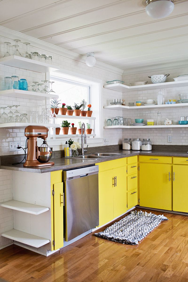 Colorful potted plants in a kitchen window