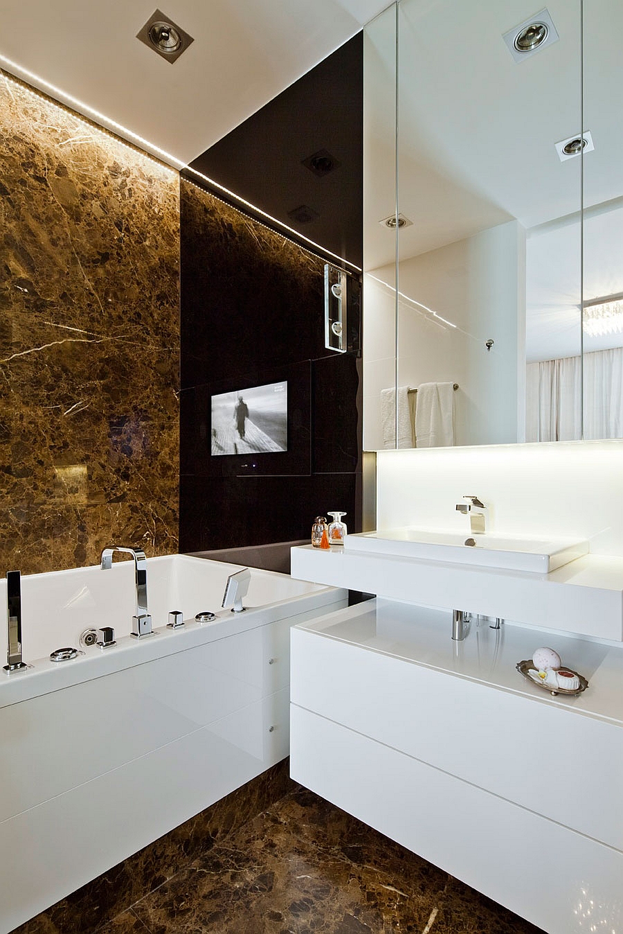 Contemporary bath with a touch of golden charm