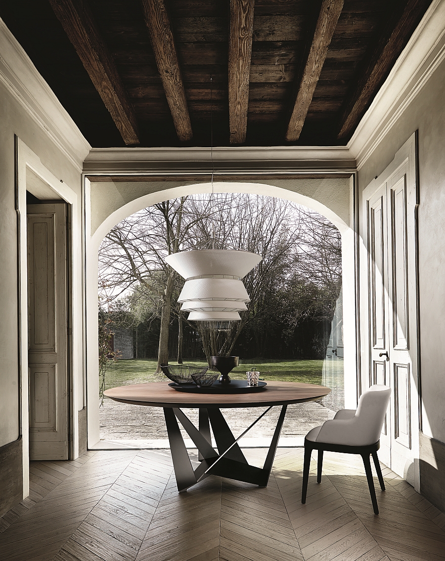 Contemporary modern table with sculptural base and heritage oak top