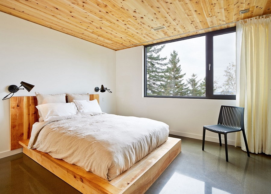 Cozy, minimal bedroom with a unique platform bed