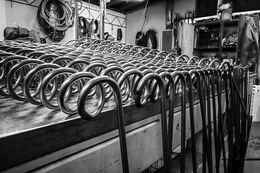 Curved metal that goes into the making of the legs