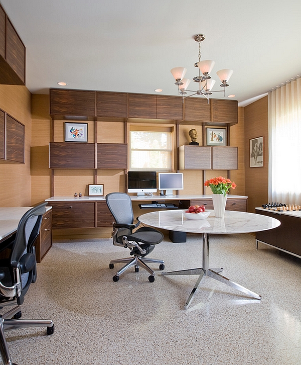 Custom floating cabinets and desks along with Midcentury modern decor for basement home office