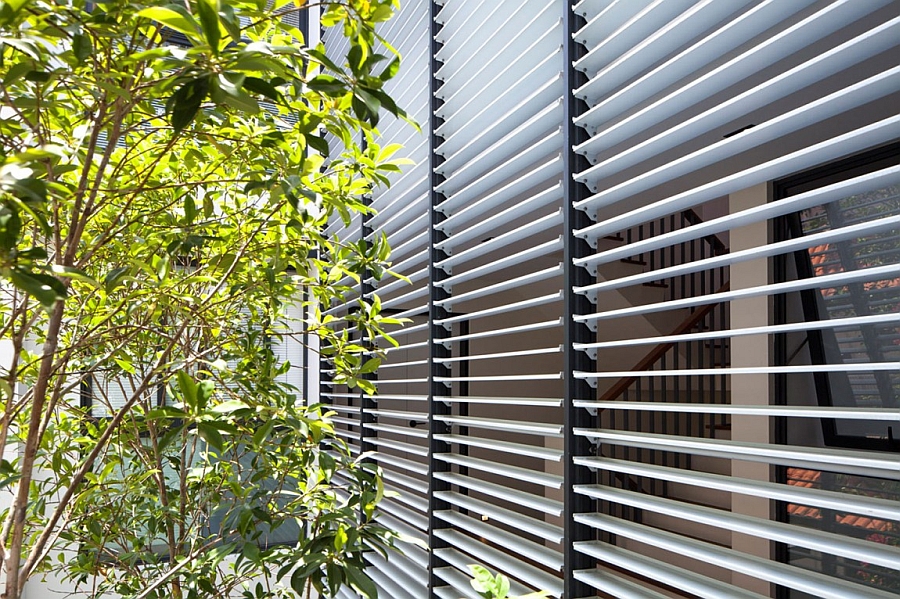 Custom made operable louvers in the courtyard