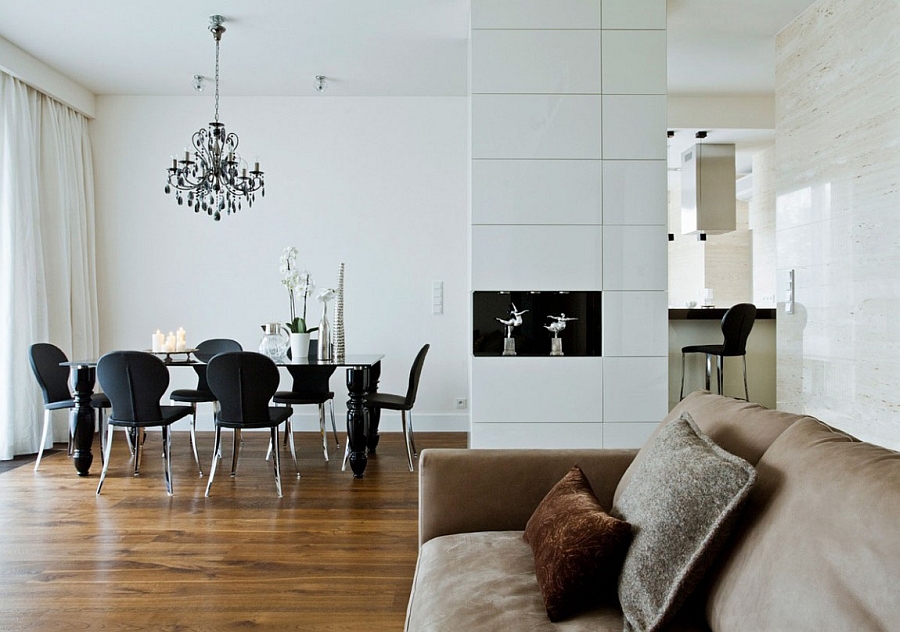 Dark dining room chairs standout thanks to the white backdrop