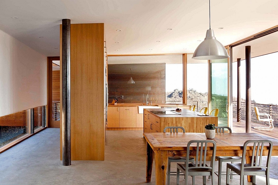 Dining area and kitchen clad in wood