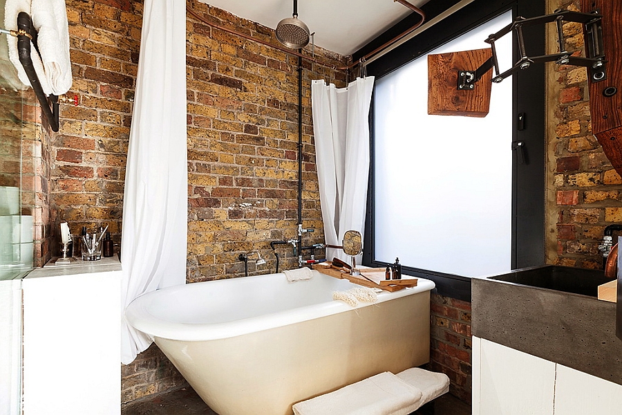 Exposed brick walls in the bathroom give it a rustic look