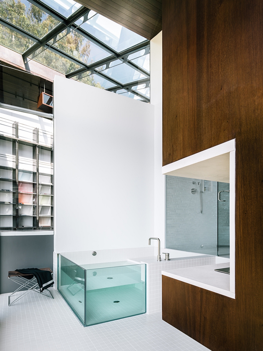 Exquisite bathroom with minimal design and wood accents