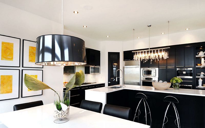 Gorgeous chandelier enlivens the black and white kitchen