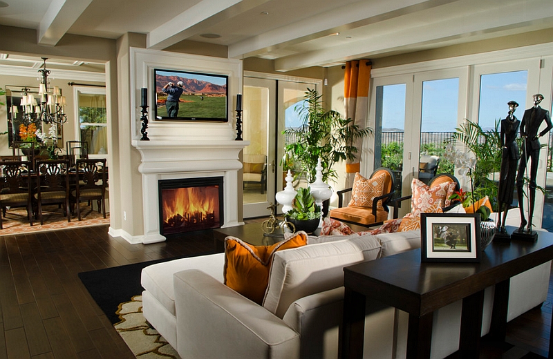 Gorgeous living room with TV above the classic fireplace