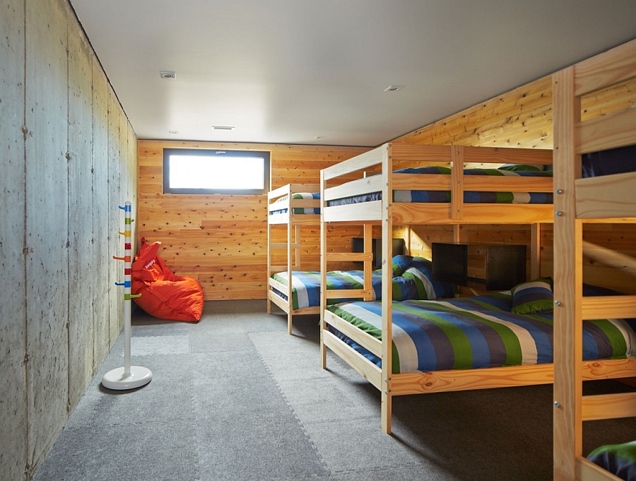 Kids' room with bink beds and a rustic cabin look