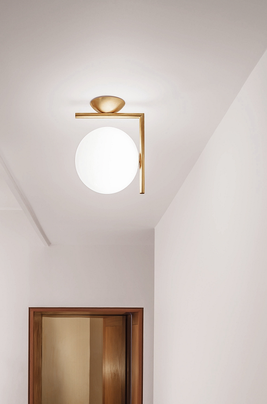 Light up your hallways in style with the IC wall-mounted light