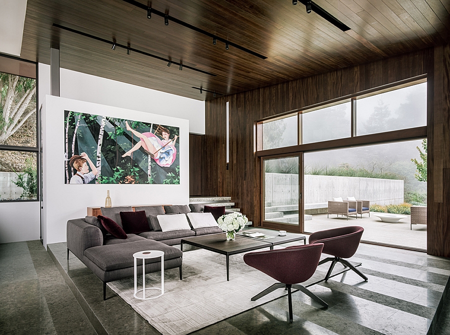 Living space with plush decor and wooden panelling