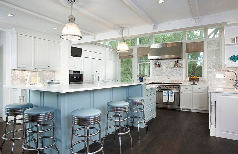 Lovely bar stools complement the color scheme of the kitchen