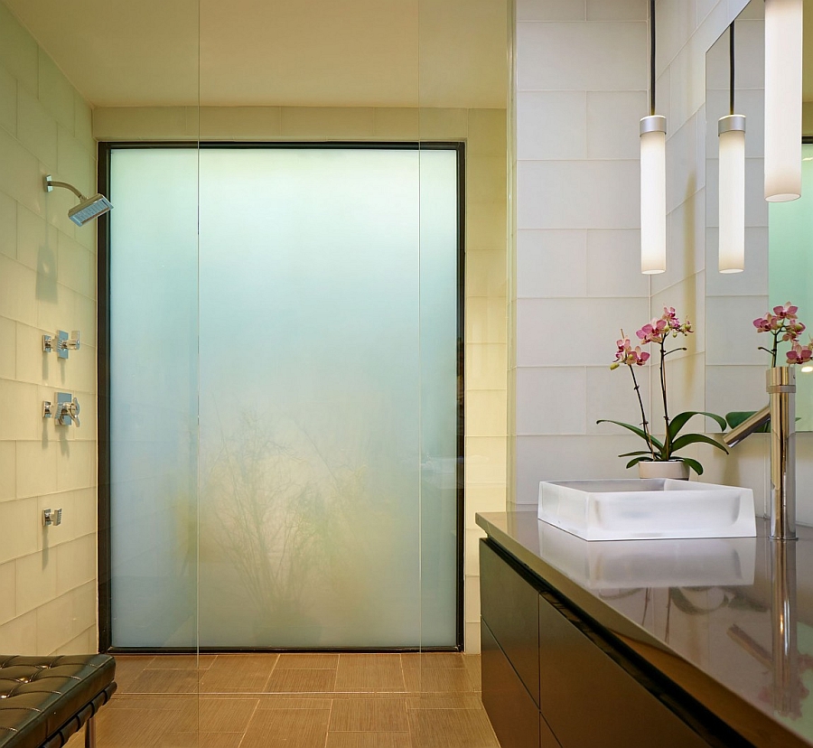 Lovely glass shower area in the bath