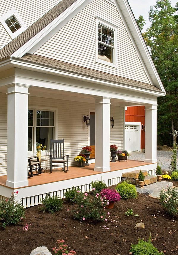 Lovely porch with colorful flowers and potted plants