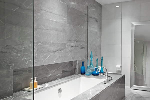 Master bathroom featuring grey marble