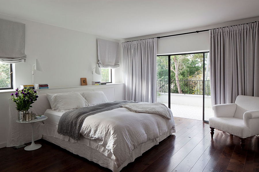 Master bedroom and balcony overlooking the pool