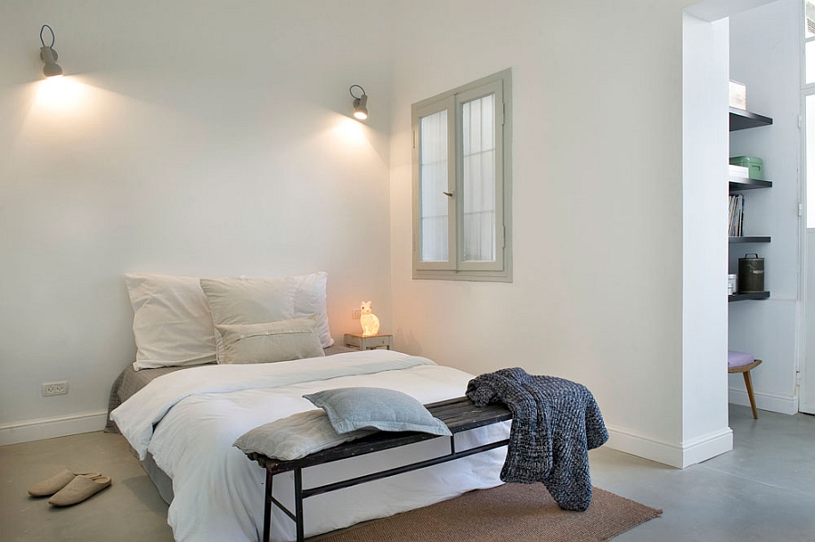 Modern bedroom in white with grey painted bed