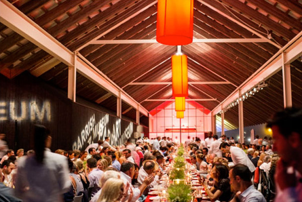 Red tablecloths and pendant lighting