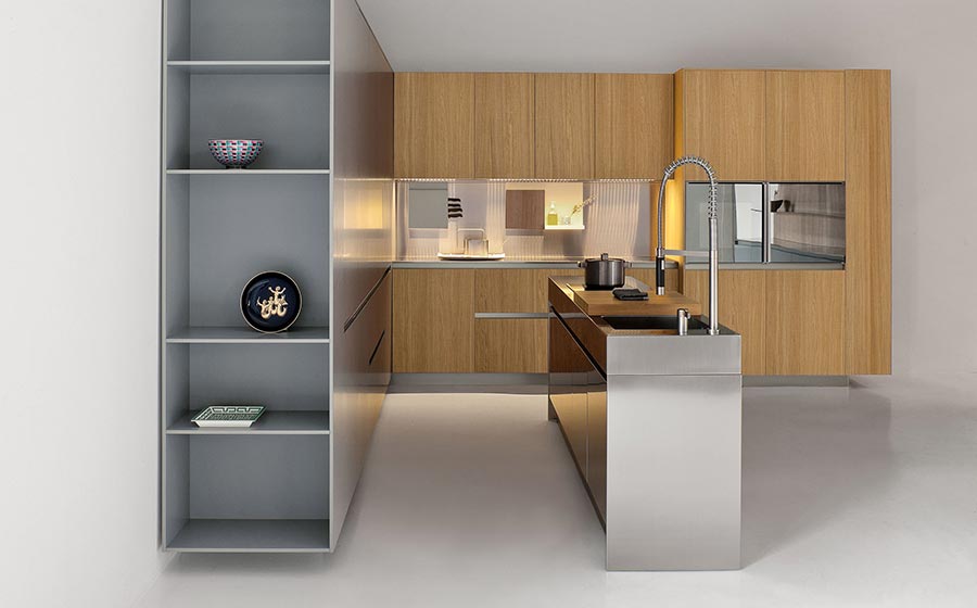 Sleek kitchen island in stainless steel with shelves and cabinets in wood