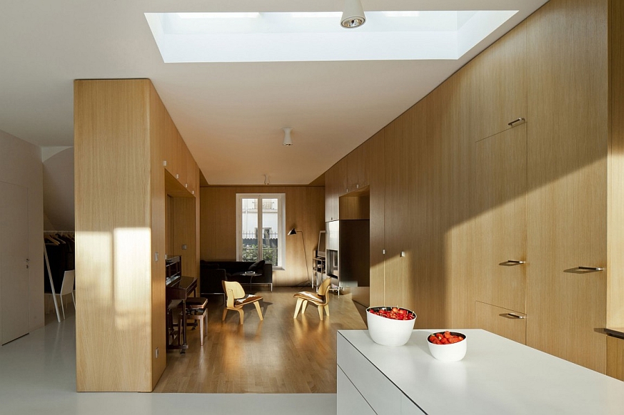 Sleek, modern interiors draped in wood