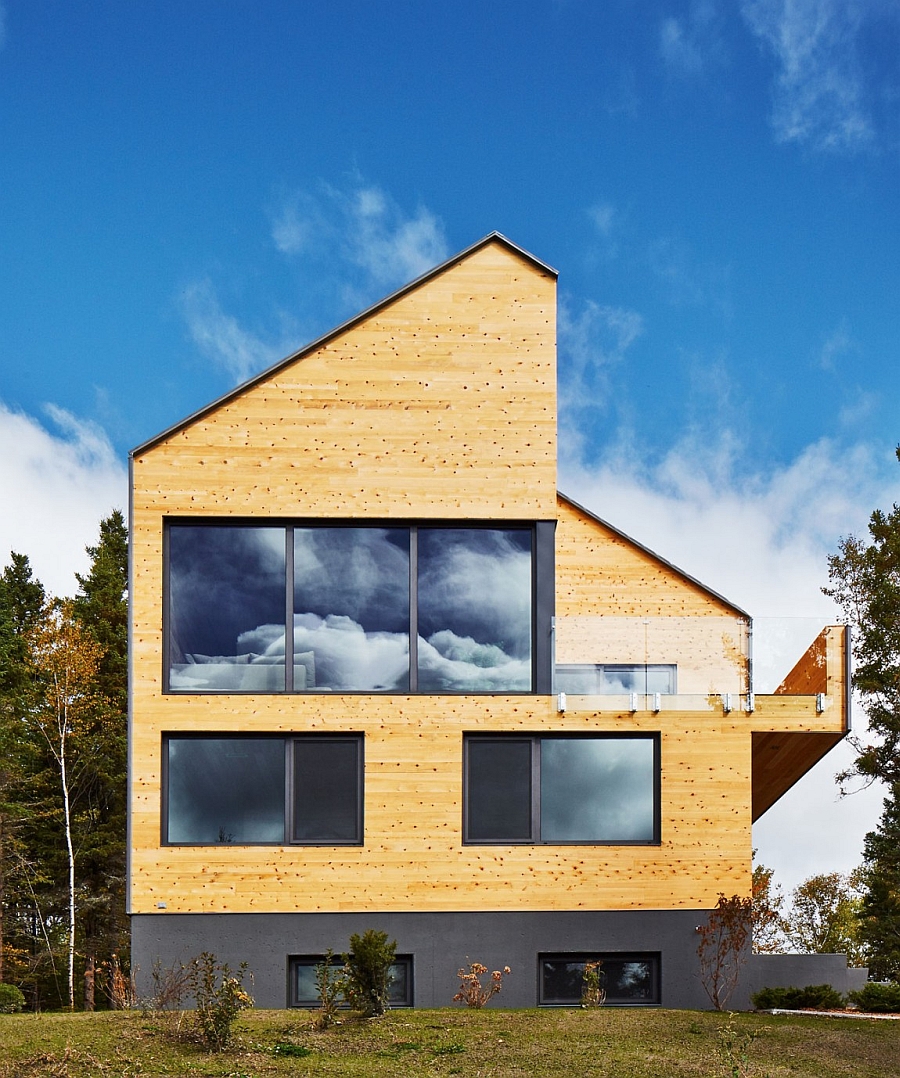 Sliding glass windows add an interesting visual element to the residence