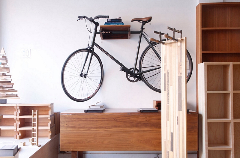 Smart bike holder also offers some additional space for a few books