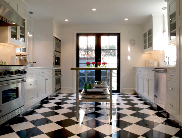 Stainless steel island adds a classic touch to this modern kitchen