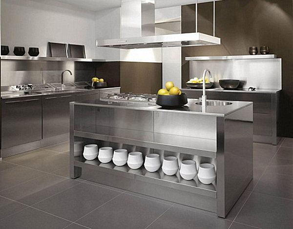 Stainless steel kitchen island with a bowl of fruit on top