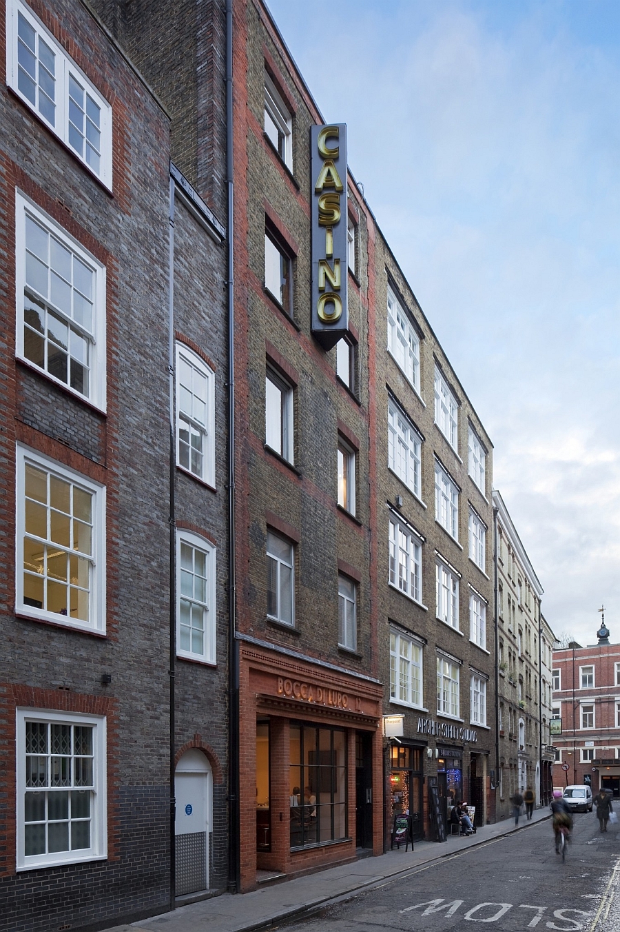 Street facade of the apartment building on Archer Street, Soho, London